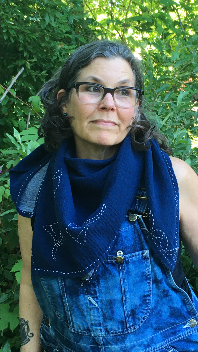 artist photo outdoors with scarf.png