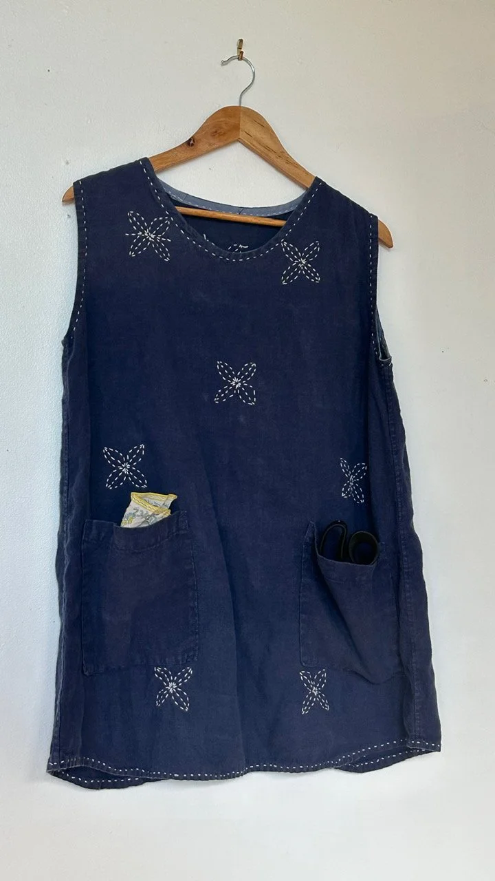 linen tunic with large flower stitch.JPG