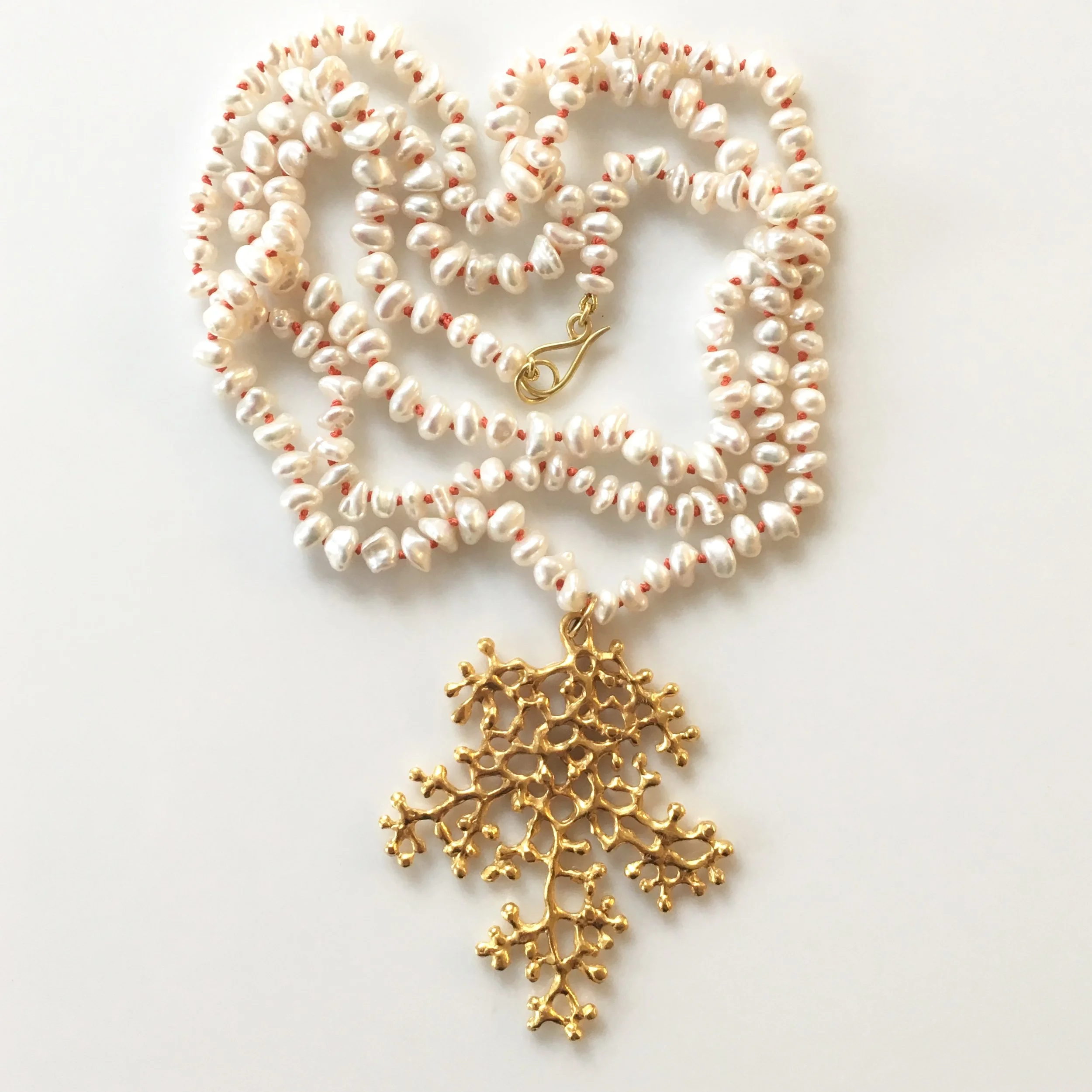 coral fan with pearls.jpeg