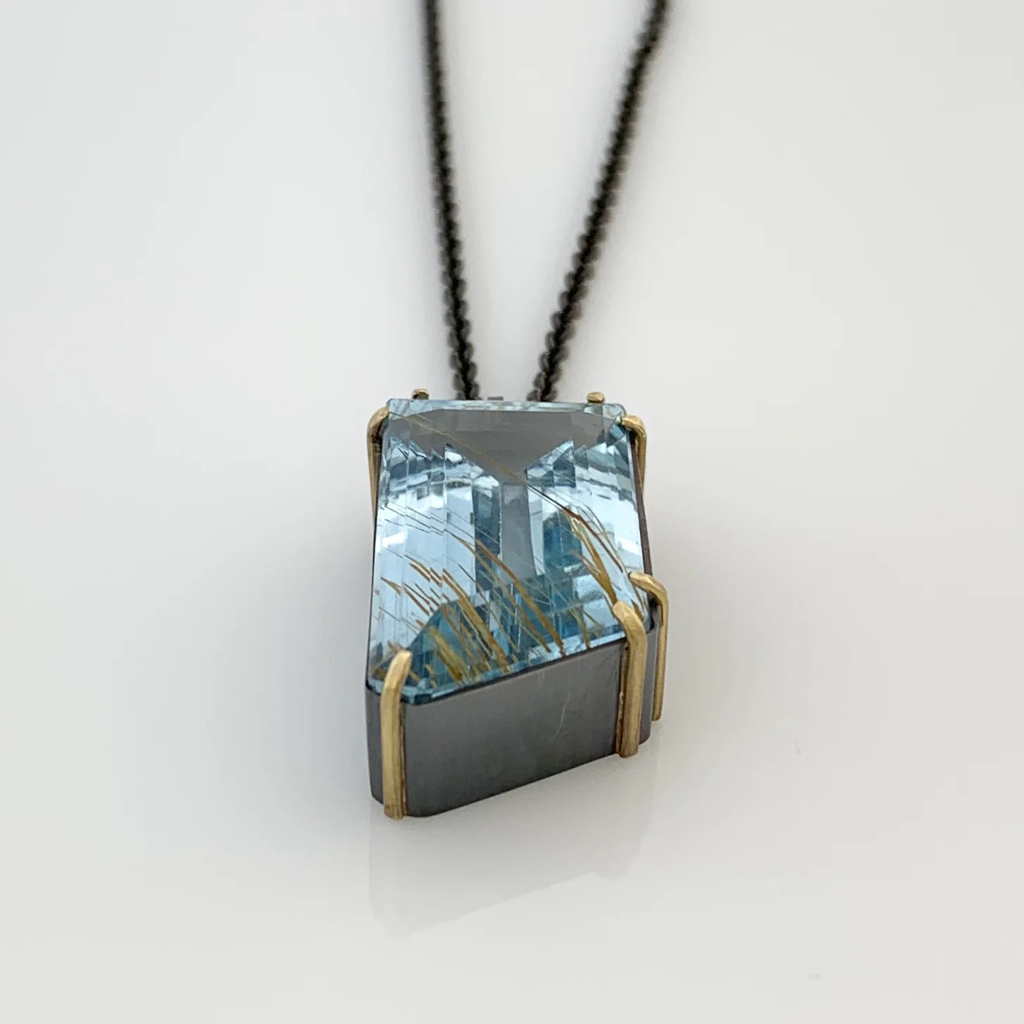 rutilated aqua side view.jpeg