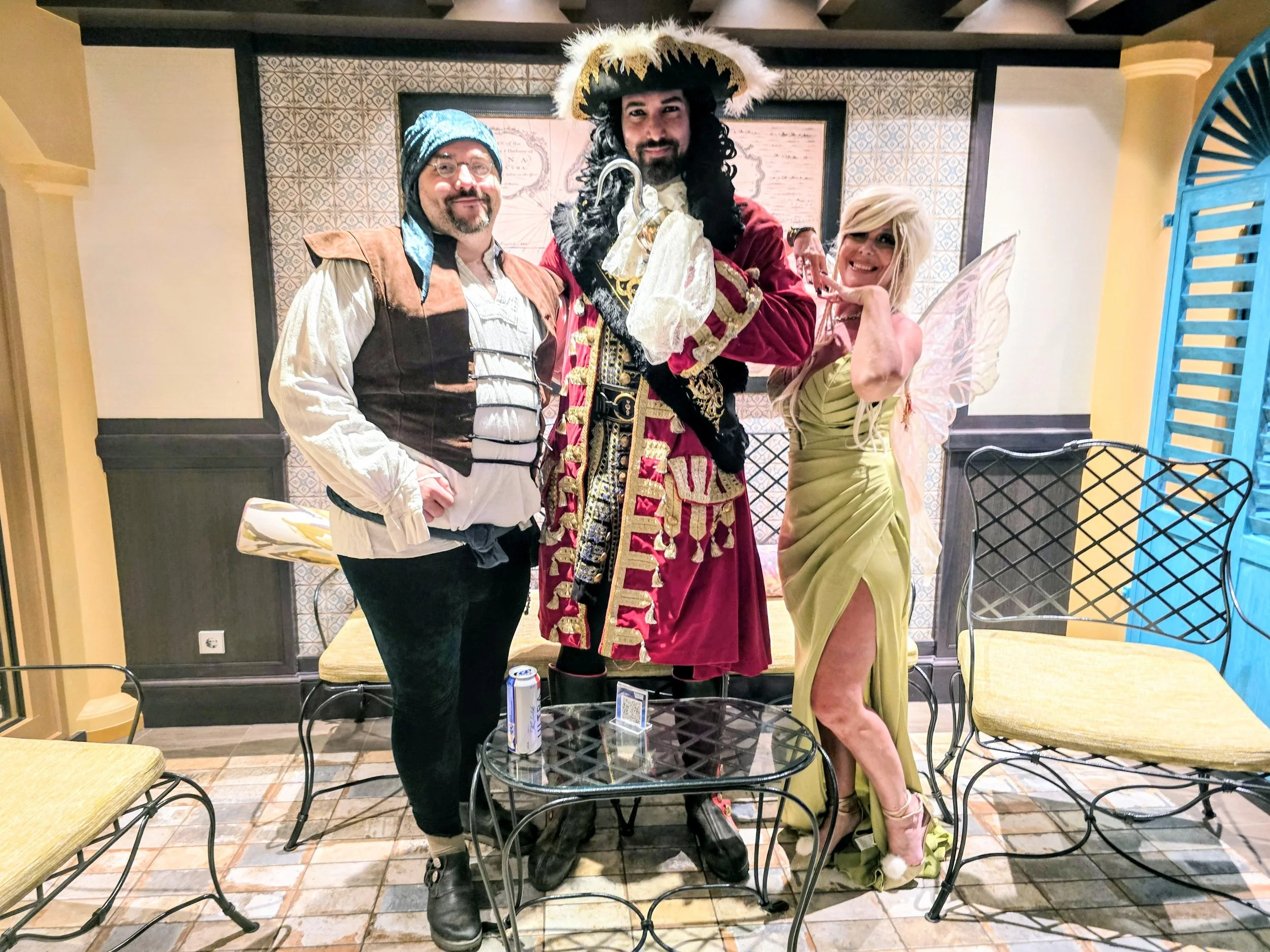 Posing with Smee and Tinker Bell at a private party.