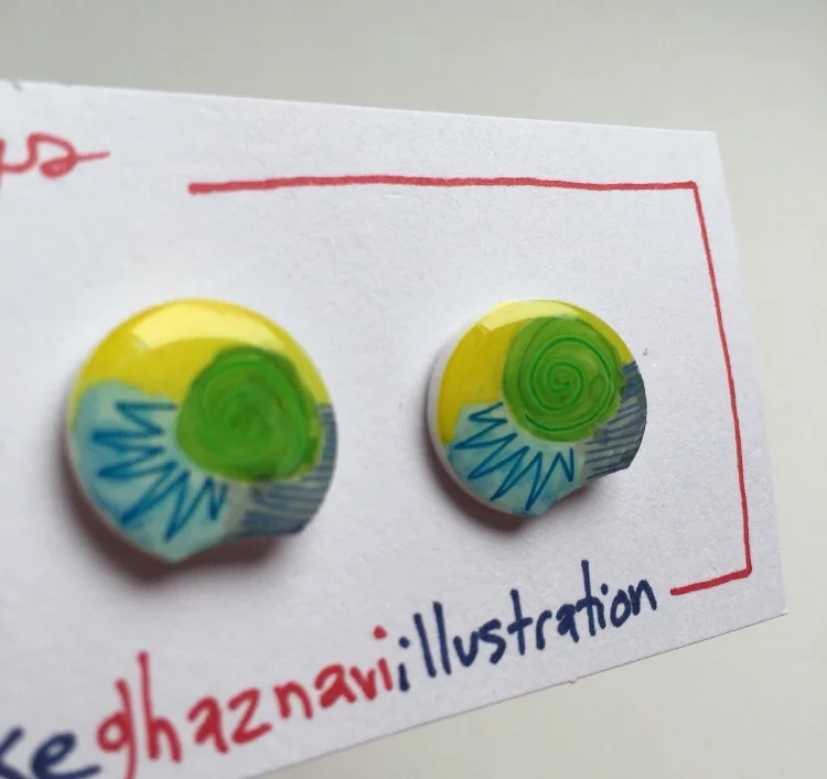 Funky little earrings.