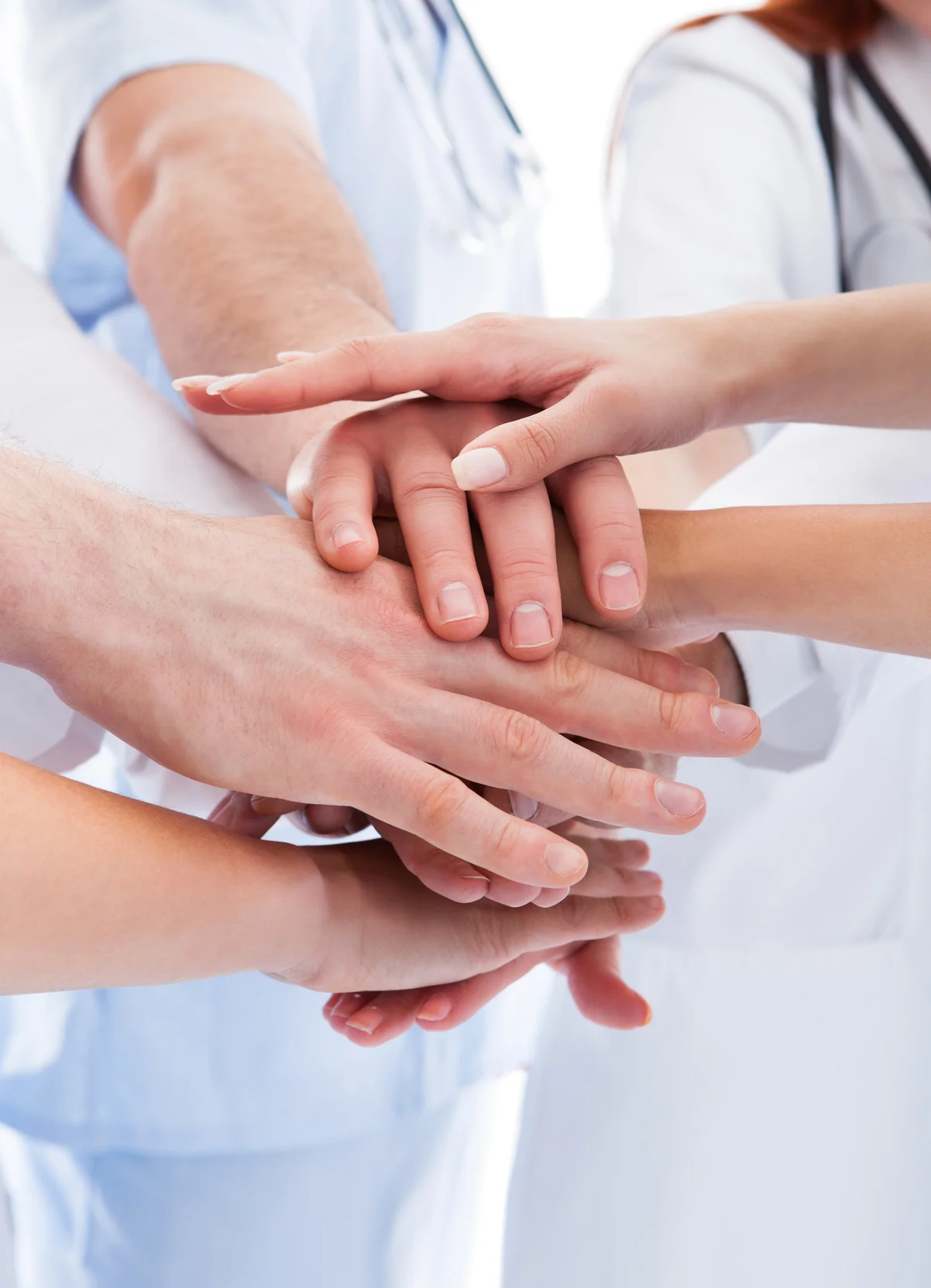 photodune-7482107-medical-team-stacking-hands-m.jpg