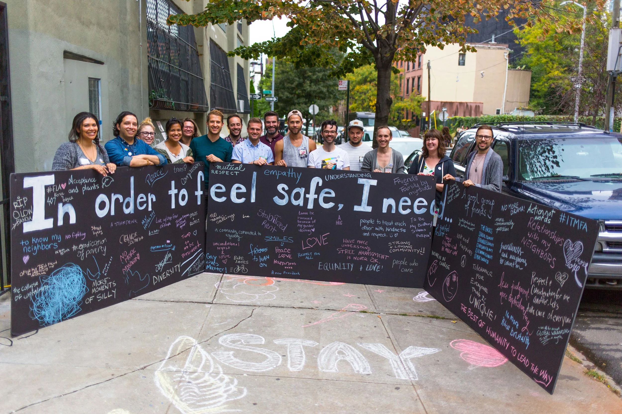A few VideoOut helpers in front of a Kindness Party installation, In Order to Feel Safe Wall . October 2017.