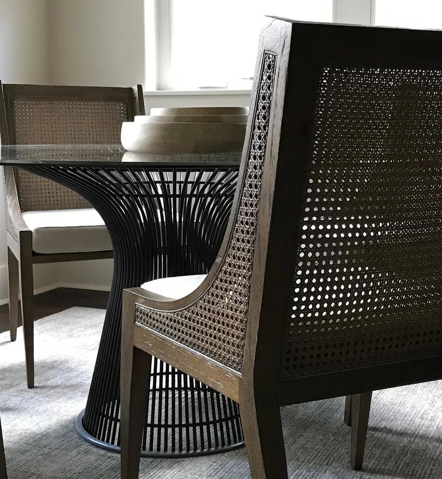 One of my favorite courses in design school was the history of furniture. This mid century table is timeless and so is the use of cane in furniture. I loved having the opportunity to use both iconic styles in this space. #karibrowndesign #houstoninte