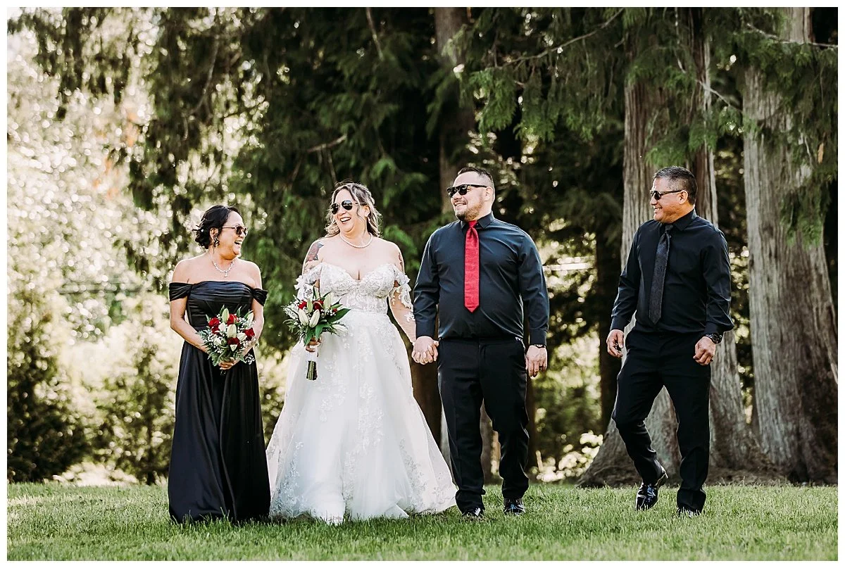 Bride, groom, and wedding party posing outdoors at Bridlewood Wedding Venue in Chilliwack, BC