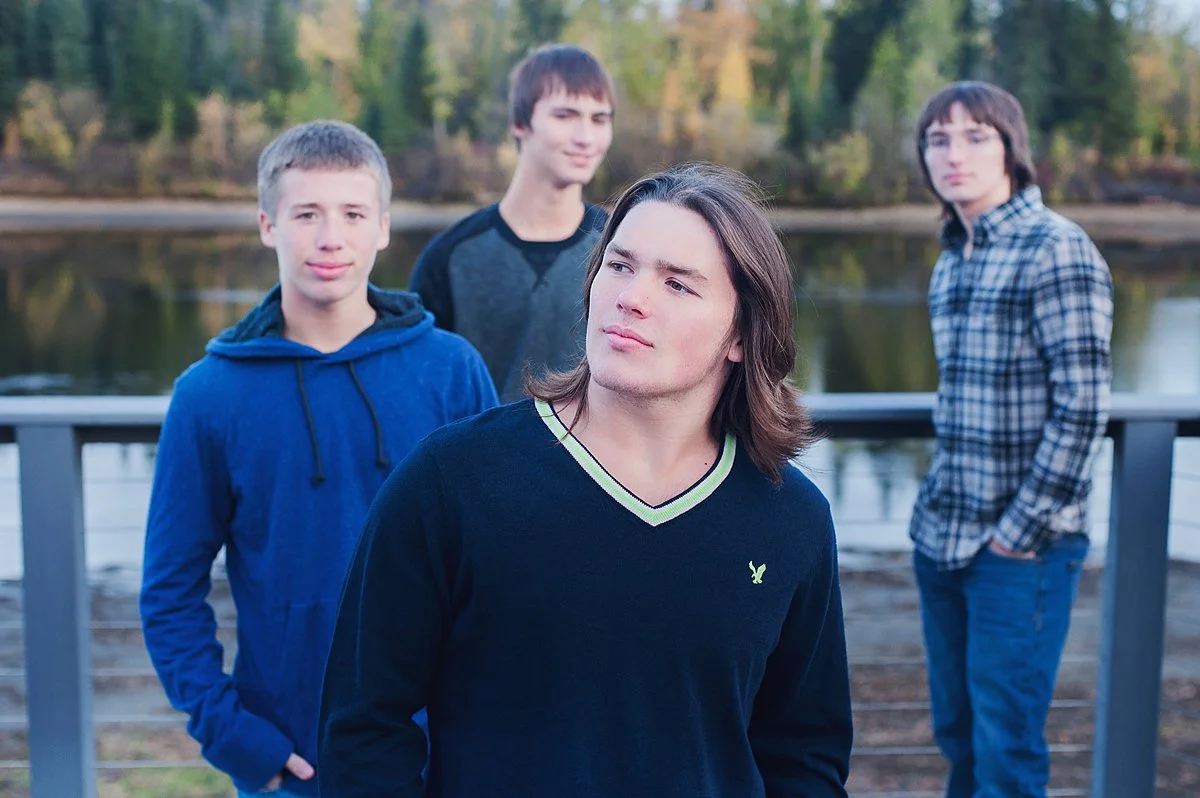 Brothers doing their "album cover" pose. Senior photos for boys and their siblings. 