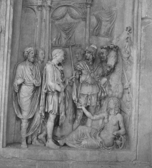 Fig. 8 Adventus scene from the Arch of Constantine. featuring a reclining personification of the Via Flaminia.