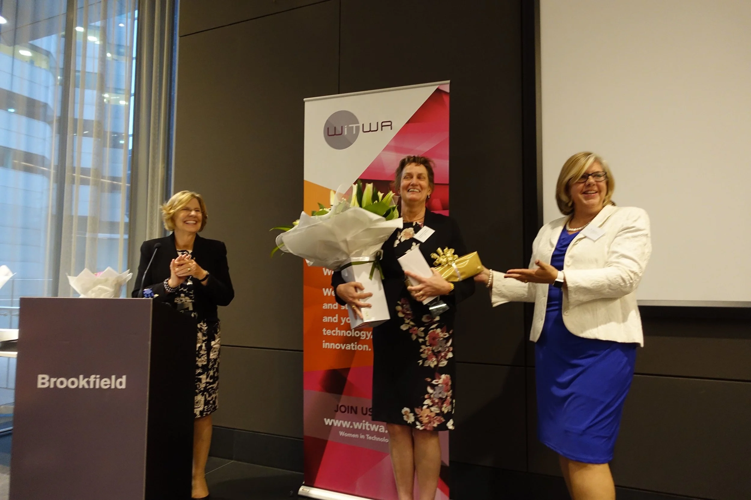 Marjolein Towler being presented gifts OF APPRECIATION by Pia Turcinov
