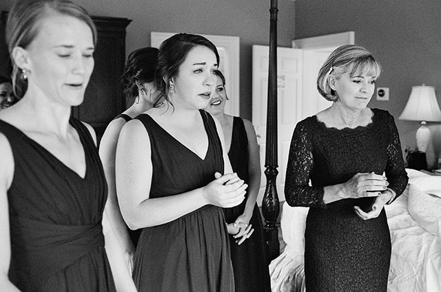 bridesmaids reaction to bride putting on dress