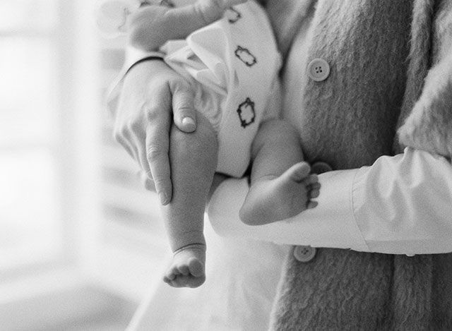 heirloom photo of mother holding newborn