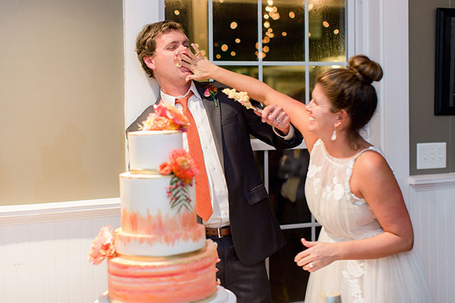 bride smashes cake into groom's face