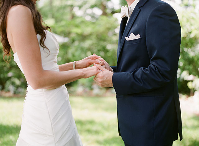 bride and groom holding hands - Sarah Der Photography