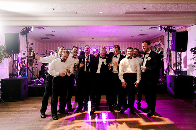 groom serenades bride on wedding day