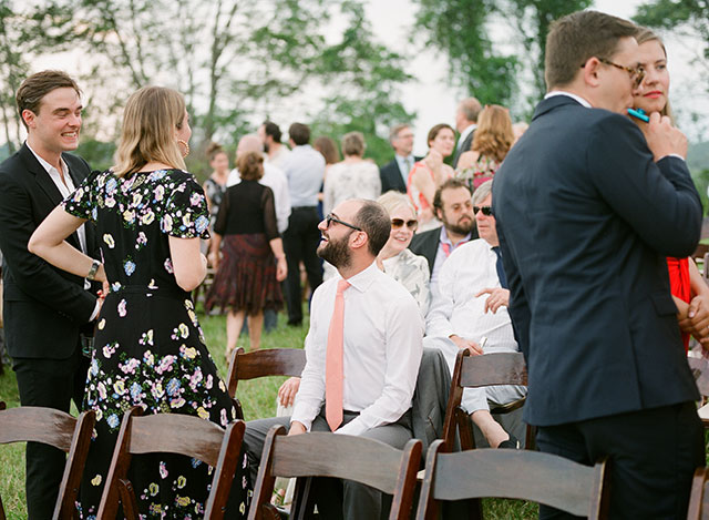 Candid photo of guests before the ceremony begins