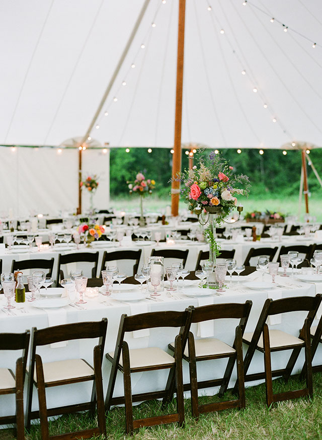 outdoor tent reception with city celebrations