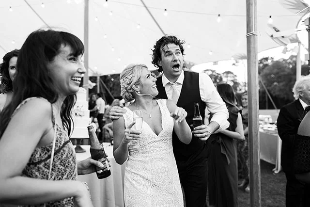 Bride surprises groom with cigar and bourbon bar and he is very pleased! By Sarah Der