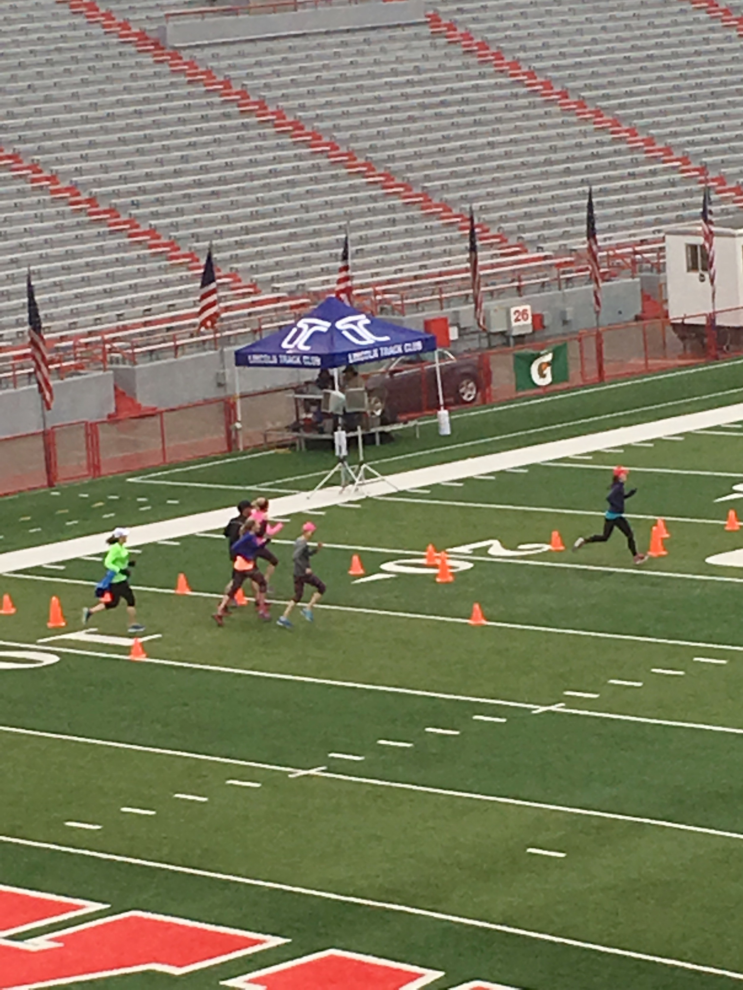 Grainy photo finish. But, guess what! They send you a video of crossing the finish line. If you're real interested and want to see for sure that I really did this, you can watch that here . 