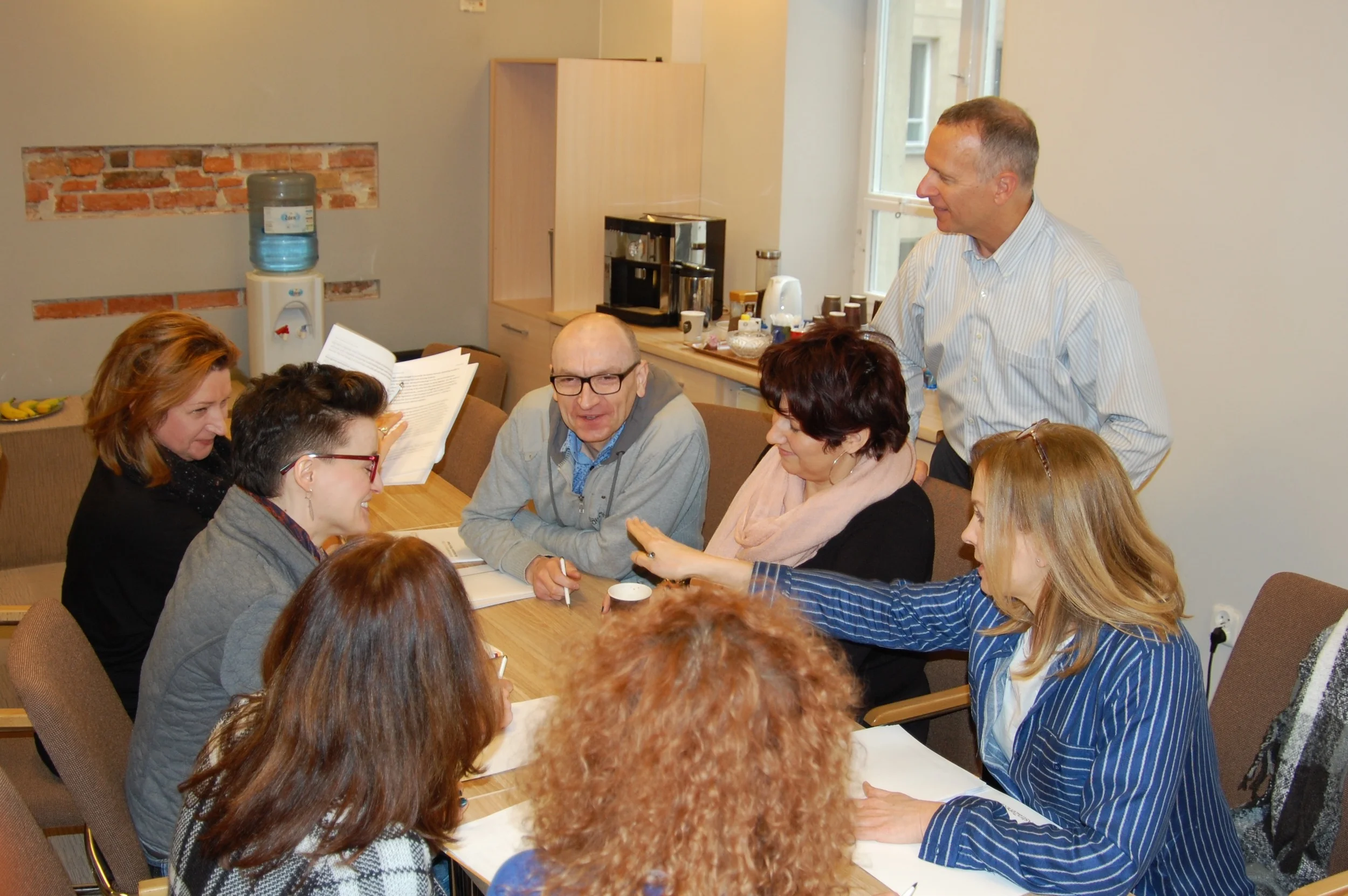 Chris Altizer working with Astra Zeneca management group in Warsaw, Poland on change management.