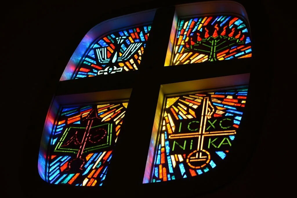 sanctuary stained glass cross.jpg