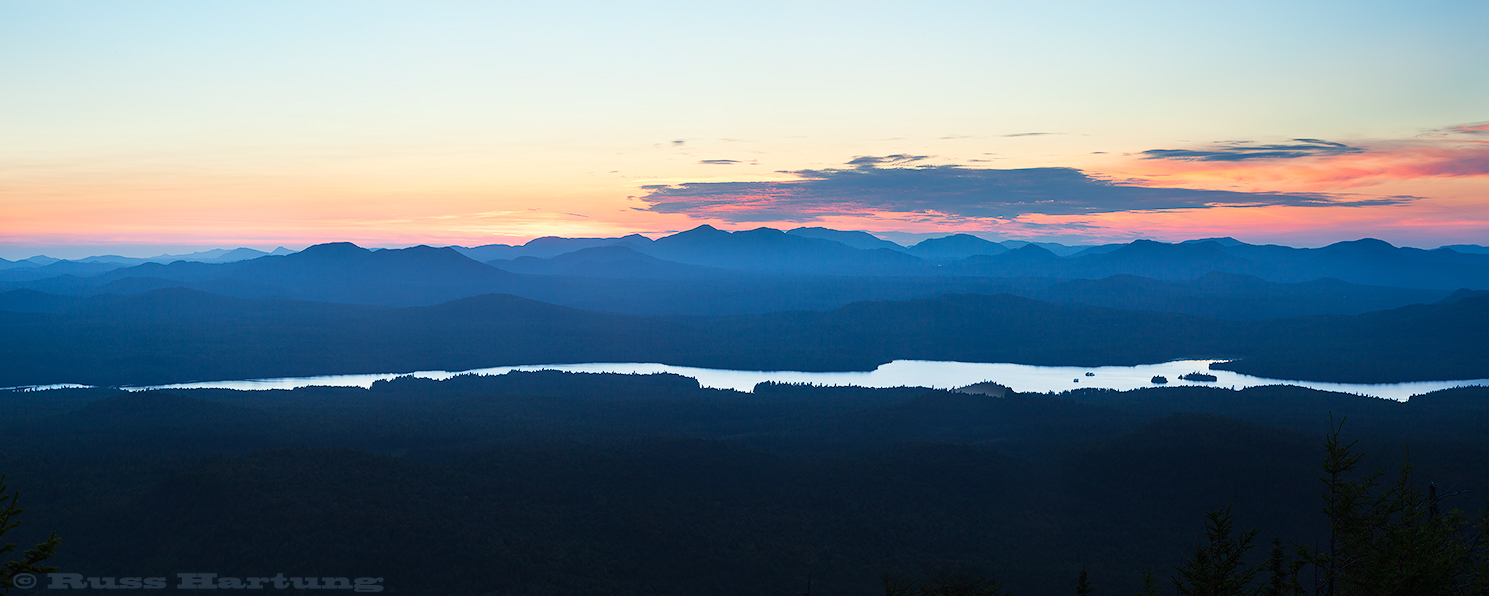 Sunrise from the top of Catamount Mountain looking West over Union Falls Pond. 