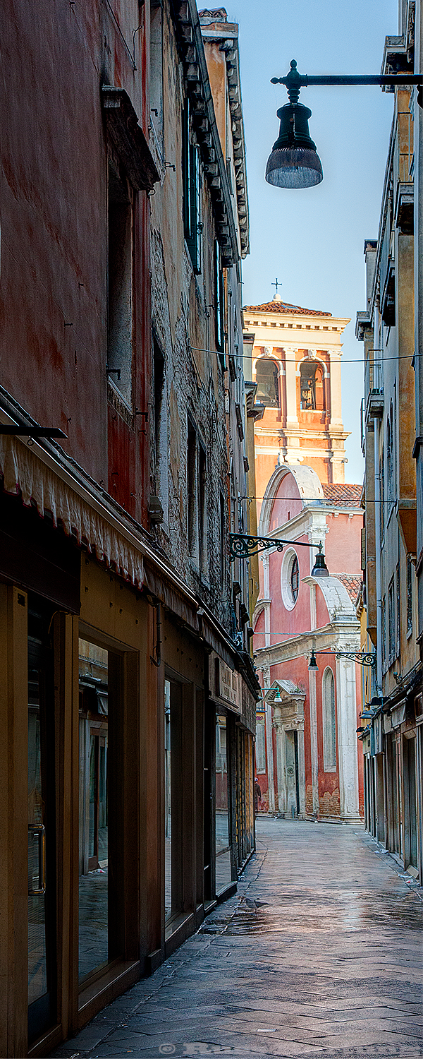 One of the many narrow streets in Venice, Italy in the early morning before the tourists were up. 