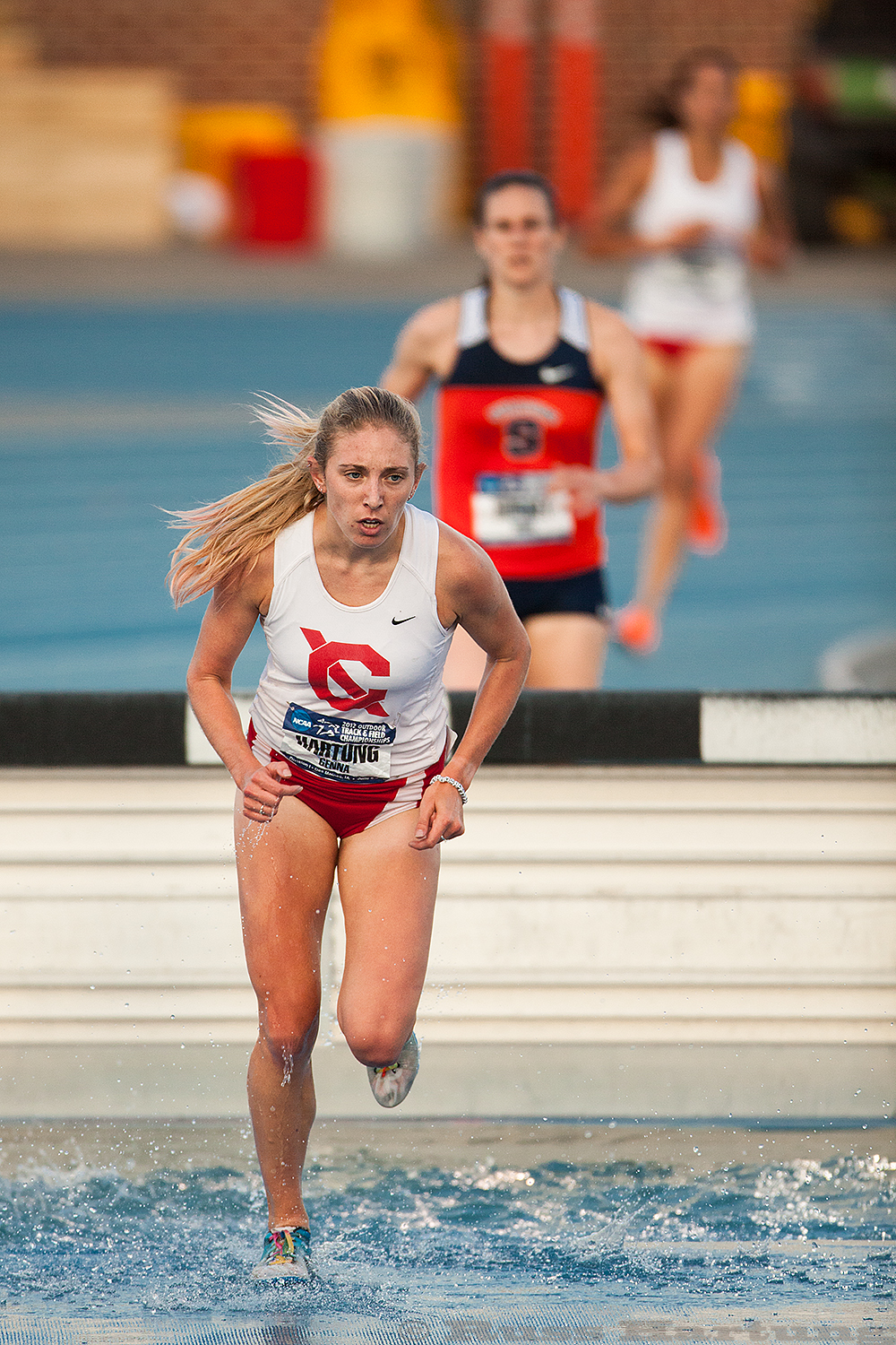 Genna Hartung clearing the water hurdle at the 2012 NCAA Division 1 Outdoor National Championships in Des Moines, Iowa. 