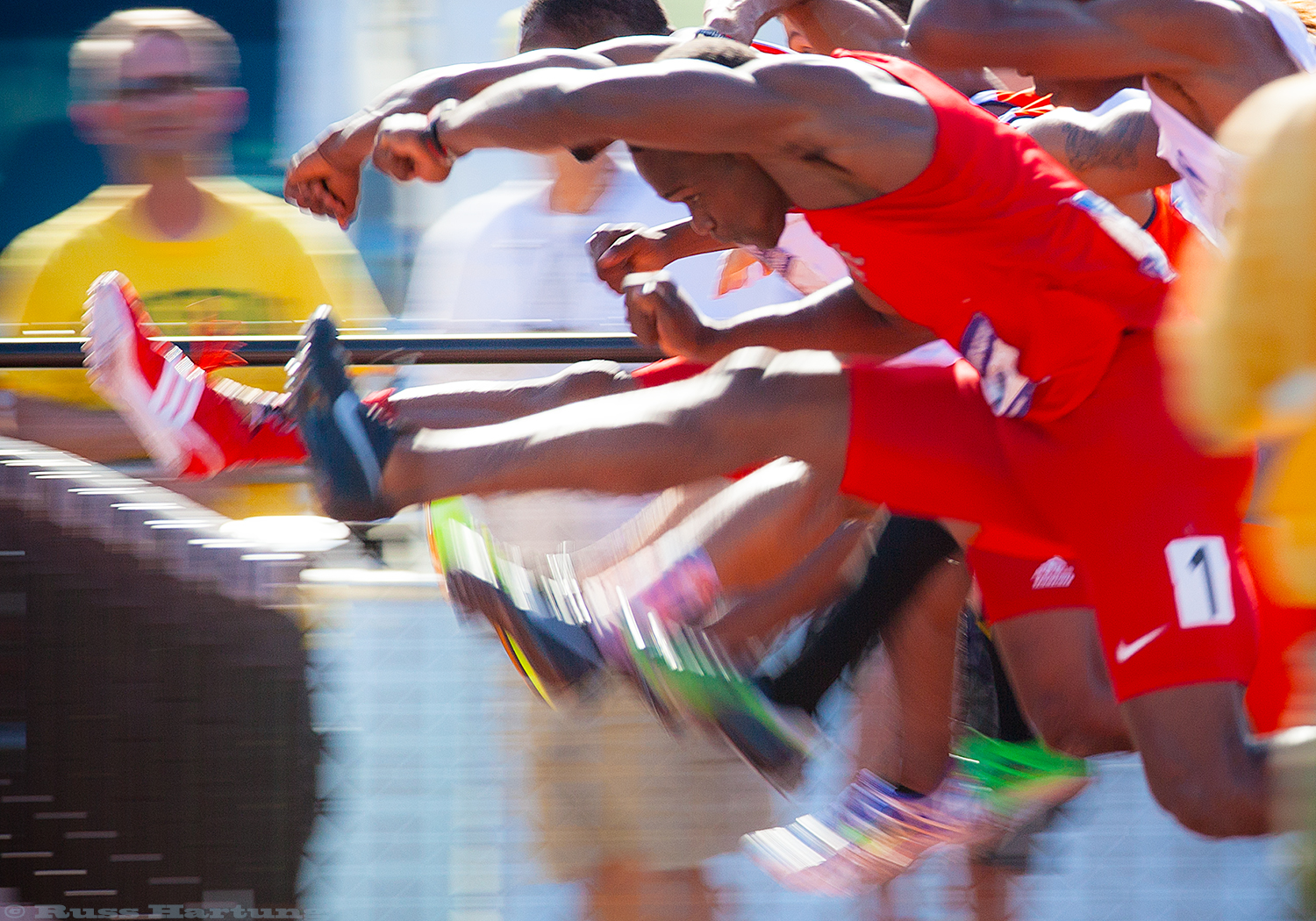 Multilegged hurdlers at the NCAA Division 1 National Championships in Eugene, Oregon. 