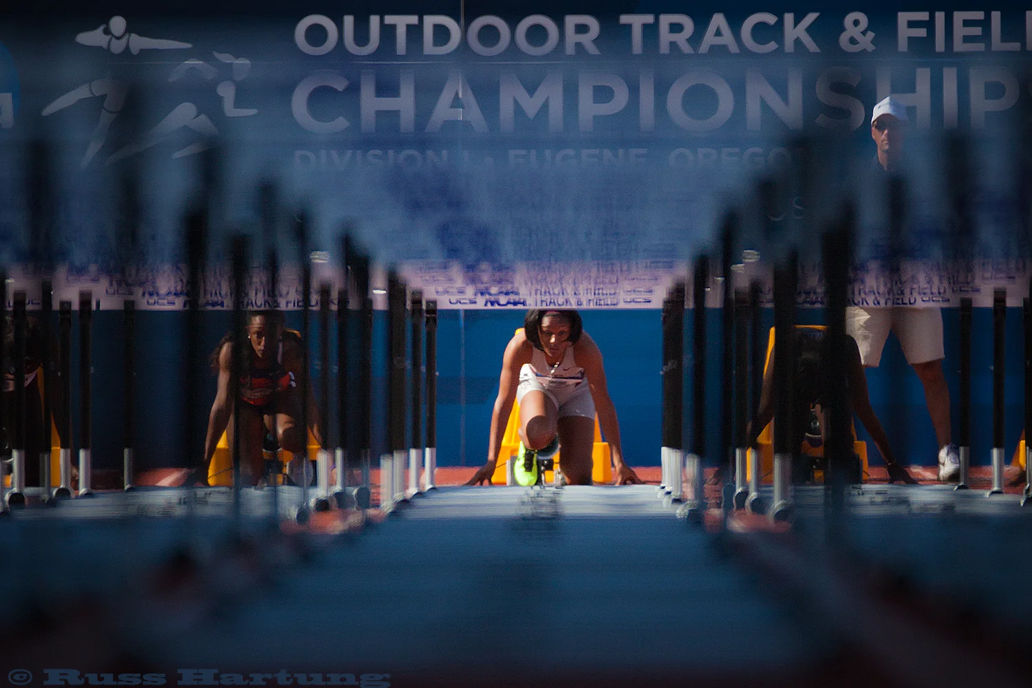 Track level view from the finish line just before the start of the hurdles at the 2013 NCAA Division 1 National Championships in Eugene, Oregon.