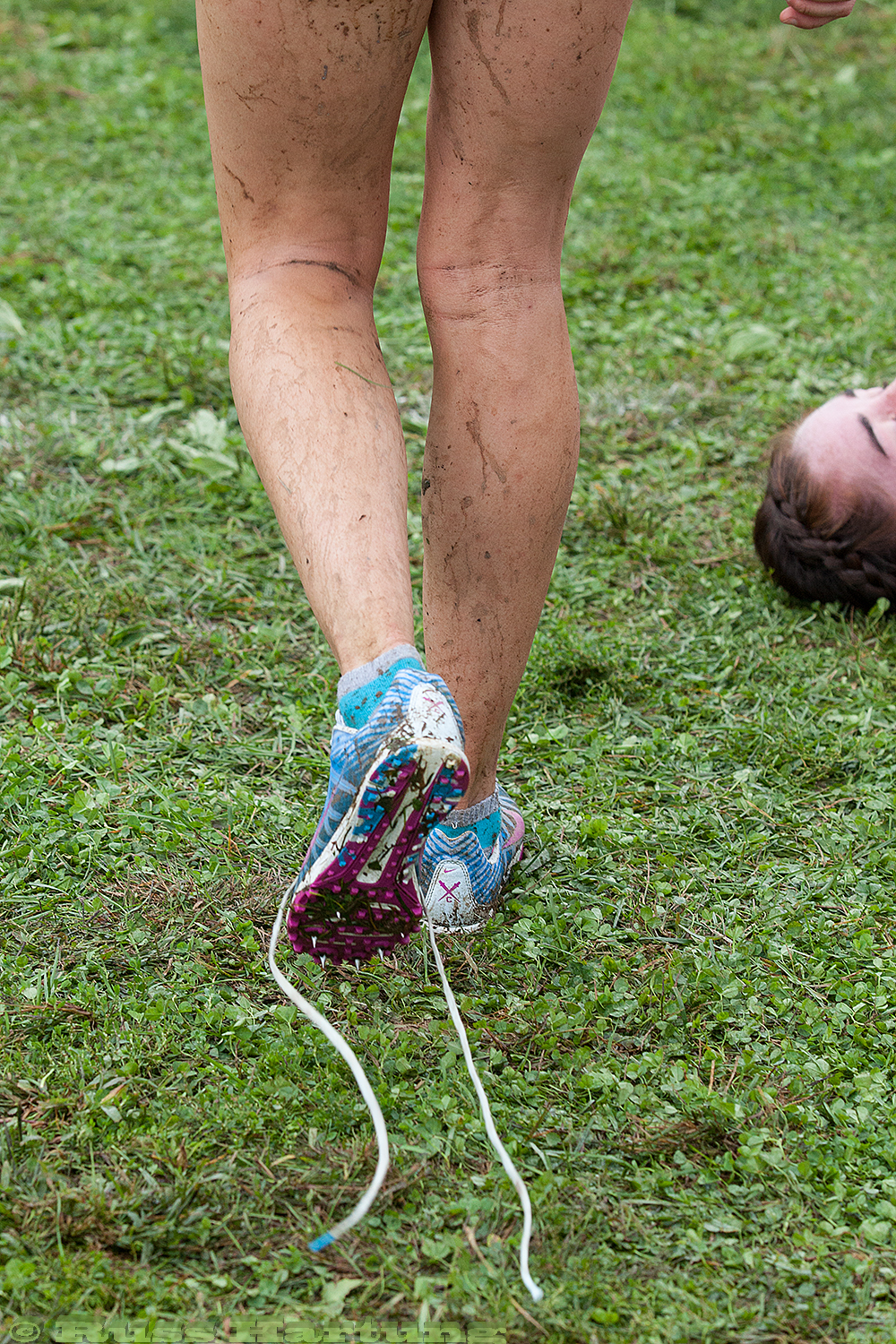 Untied laces and exhausted competitor at the Heptagonal Cross-Country Championships in Princeton. 