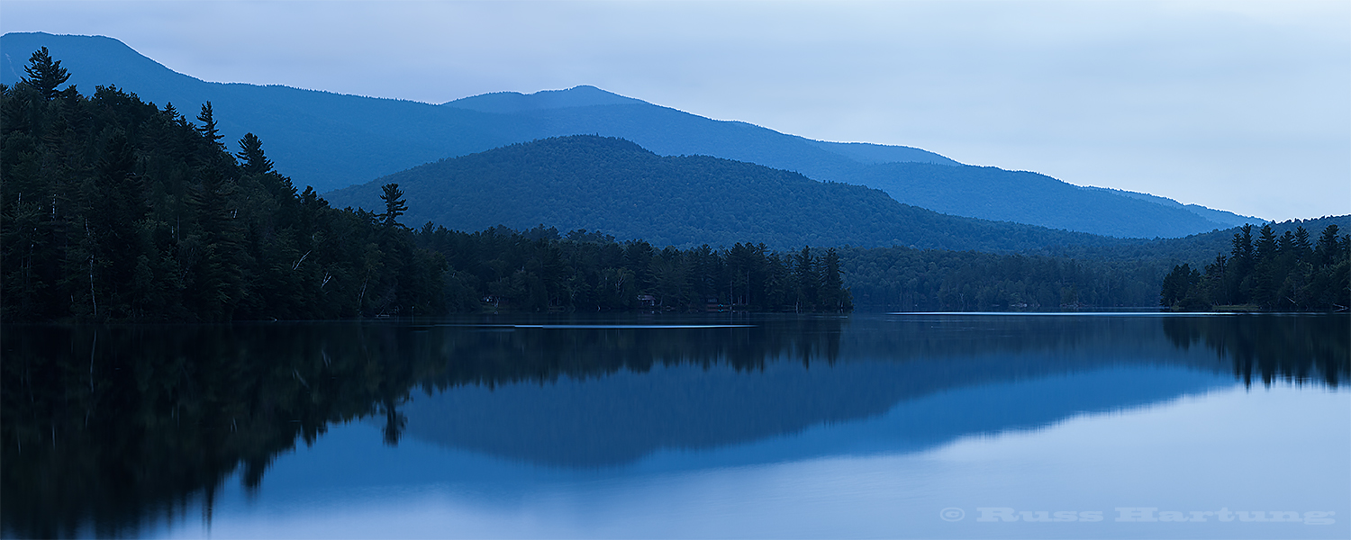 View from the canoe/kayak launch at Franklin Falls at dusk. 