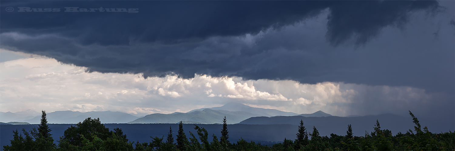 A storm moving in from the West over the High Peaks from the North. 