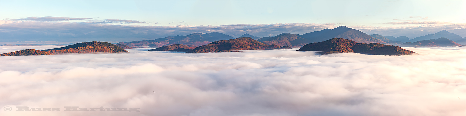 A cloud inversion settles between the mountains in the High Peaks Wilderness. View from the south. 
