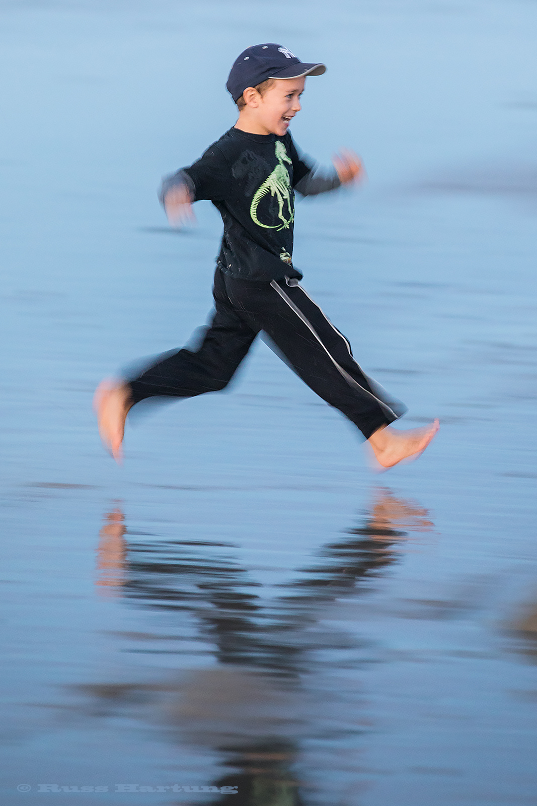 Playing tag on the beach after sunset in Maine. 