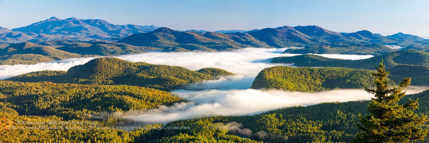 Cloud inversion settles into the valleys around Pharoah Mountain.