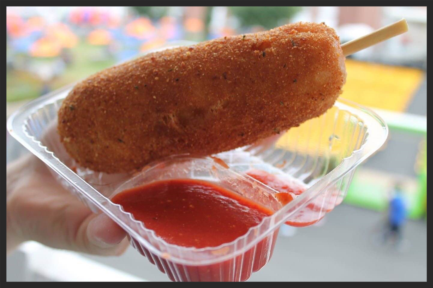 Giant Mozzarella Cheese Stick with House Marinara Sauce.