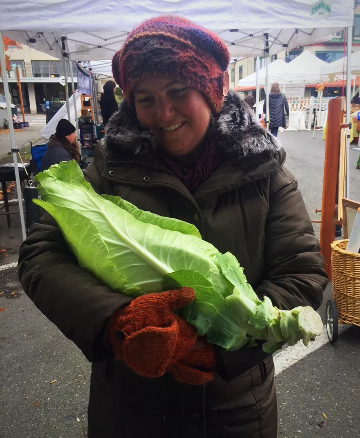 Time for some winter veggie lovin'. Assistant Market Manager, Amy Goetz, rocks her beloved cabbage from Onatrue Farm.