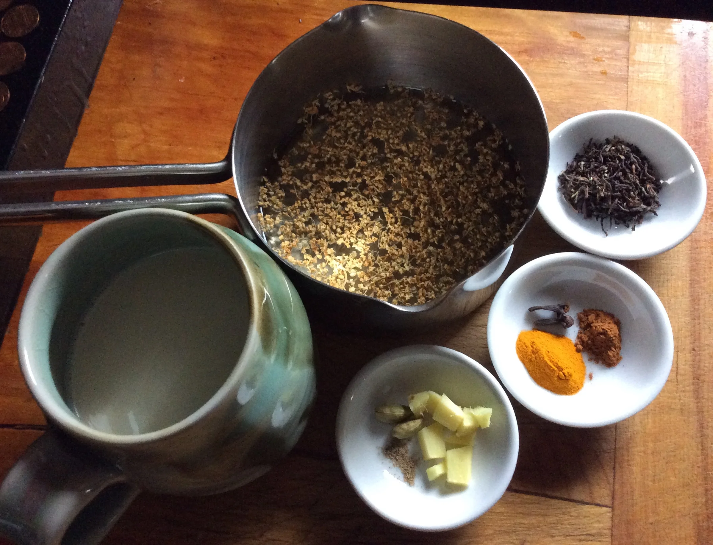Ingredients: 3/4 c. elder flowers in a small pot of water 1 tsp black tea 1 tsp ground turmeric 1 tsp cinnamon 2 whole cloves 1/4 tsp fresh ground pepper 1 inch ginger peeled and sliced 2 cardamom pods 1 c. or 1 1/2 c. milk of your choice You can also add a sweetener of your choice if you'd like. 