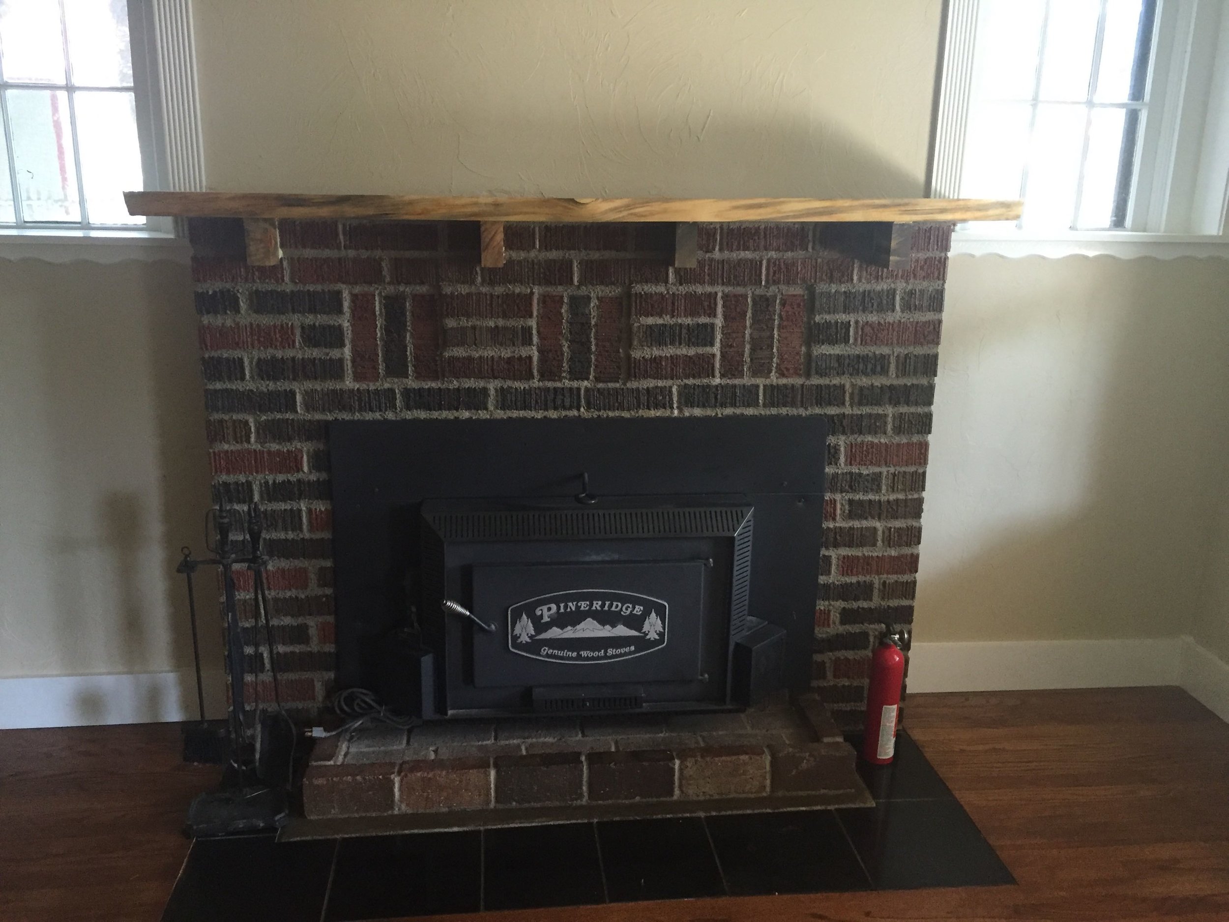 This is the wood stove in our living room. Our furnace had to be relocated to accommodate the addition upstairs, so this little thing has been keeping us warm!