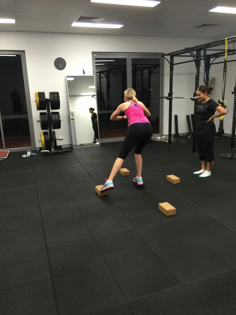 Chari teaching some balance exercises in one of our training groups.