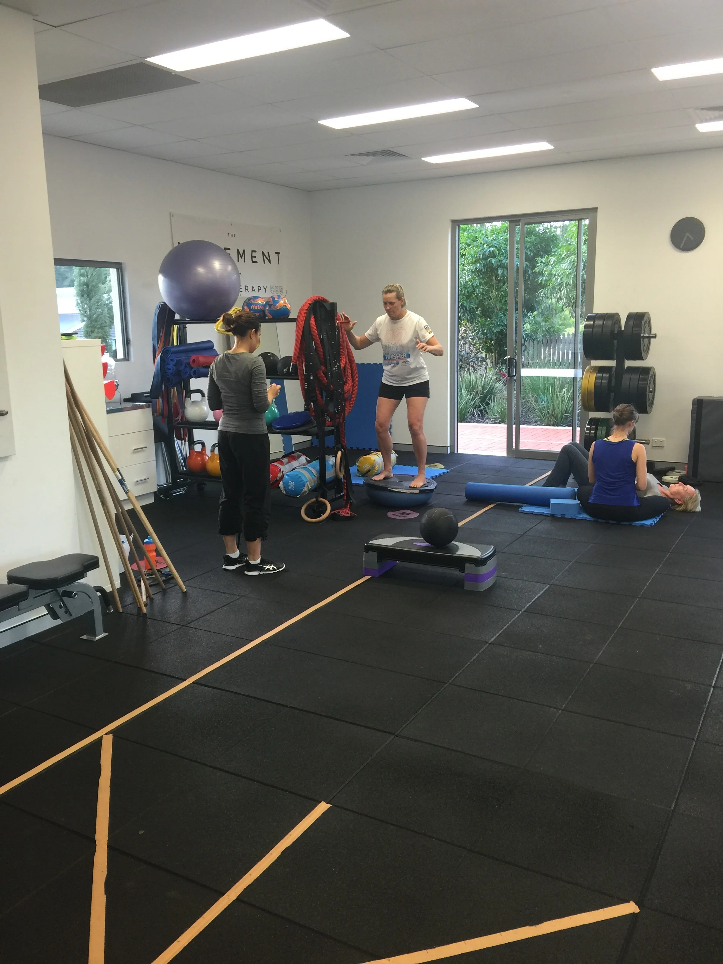 Chari and Issy working in our gym with 2 clients. 