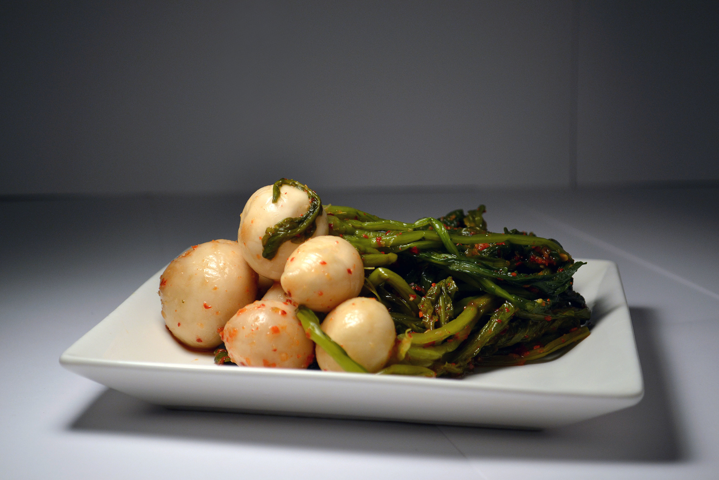 TURNIP KIMCHI: Like the Daikon Kimchi, the turnip is crunchy and tangy in taste. Natural and wholesome, the Turnip Kimchi will give you the nutrients and flavor desired.
