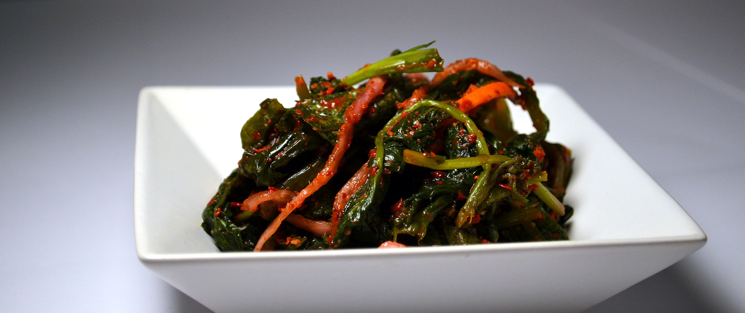 MUSTARD LEAF: The exotic taste of the Mustard Leaf and the spicy tangy fermentation process makes this Kimchi quite exquisite. It's hard to say no to the taste and the health benefits such as detoxification, cancer prevention, high in antioxidants. 