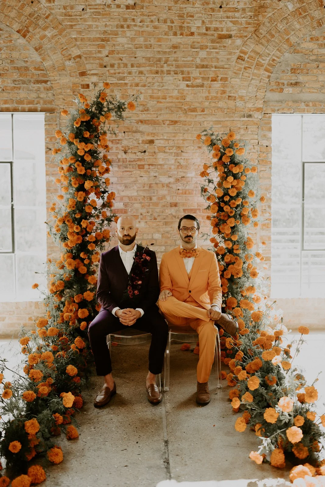 A WES ANDERSON-INSPIRED MARIGOLD + PURPLE COLOR-BLOCKED WEDDING DESIGN WITH '70S VIBES AT GARVER EVENTS IN MADISON, WISCONSIN October 25, 2023 By WedPlan Madison