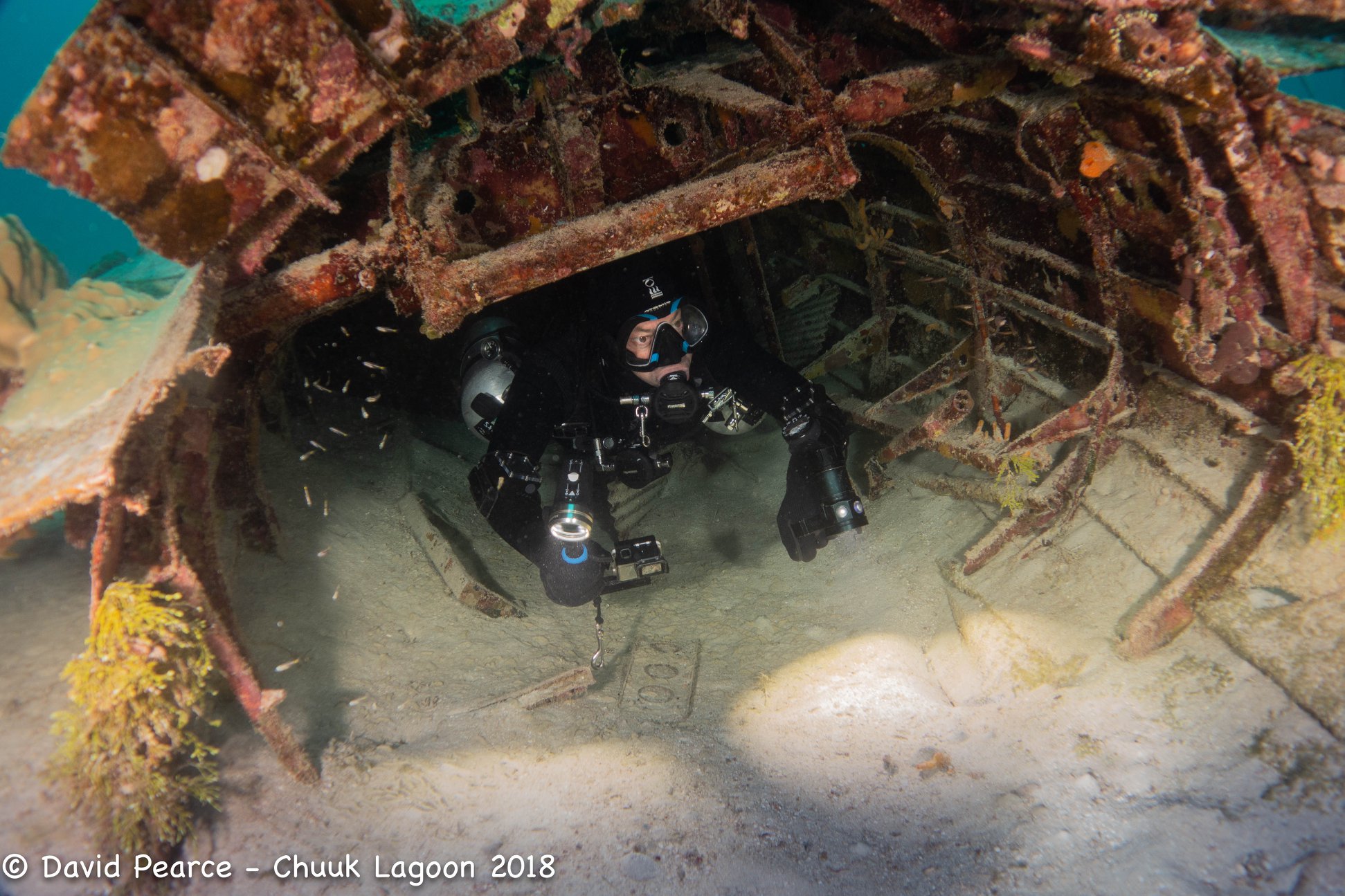 Exiting the Fuselage of Betty Bomber, Truk Lagoon