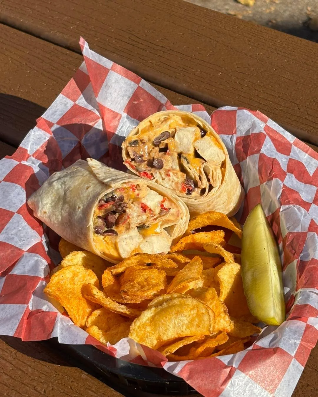 New special! The Cheesy Chicken Crunch Burrito is packed with tender chicken, slow cooked black beans, chipotle aioli, cheddar cheese, and crispy tortilla strips!