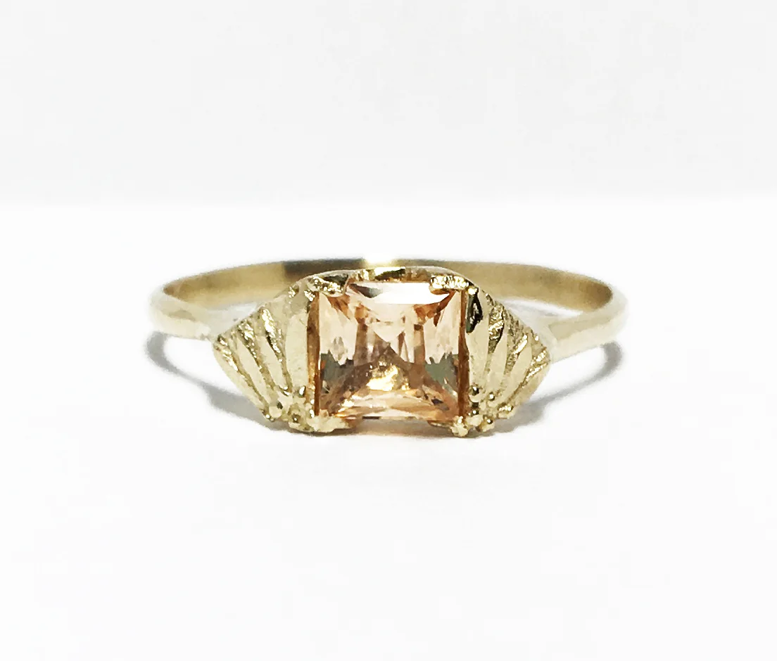 Post consumer french cut sapphire set in 14k gold engagement ring