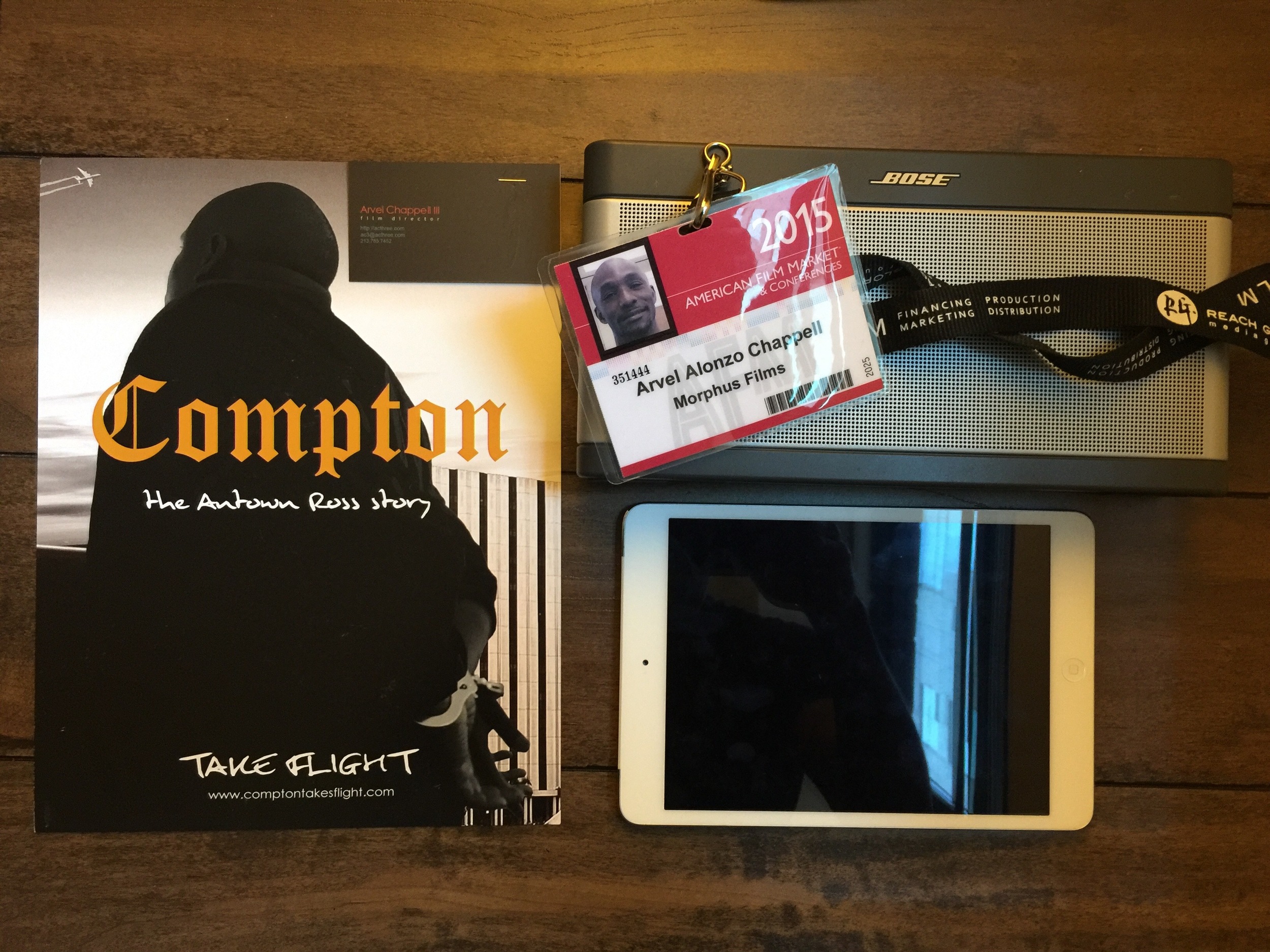 AFM materials: Ipad and bluetooth speaker to show trailer, one sheet with synopsis on back and business card on front and industry badge.