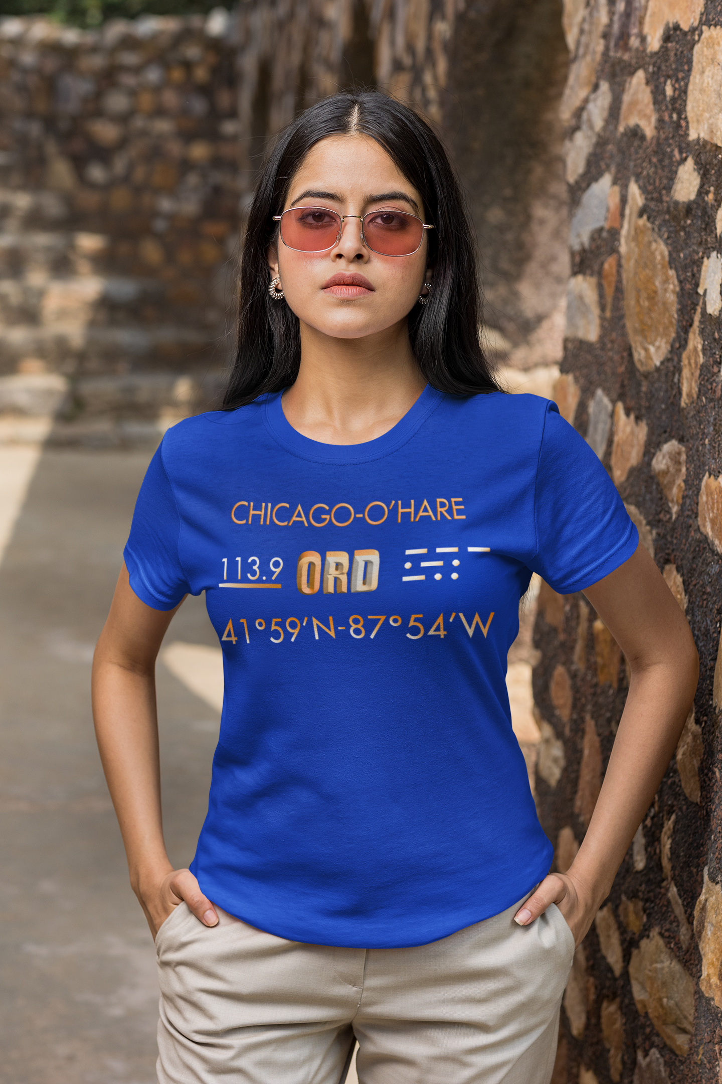 basic-t-shirt-mockup-featuring-a-serious-woman-with-sunglasses-with-her-hands-in-her-pockets-m26378.png
