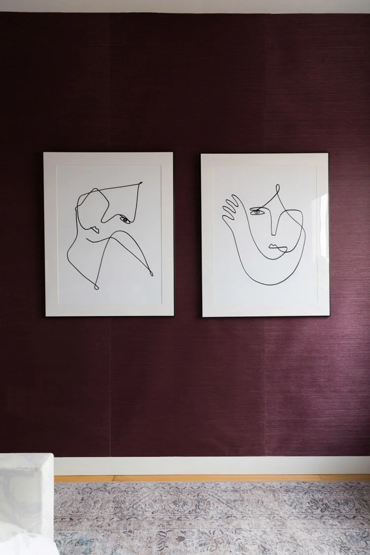 A pair of line drawings by Femme Colaris for Artfully Walls complete the space.